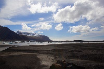 Scenic view of beach against sky