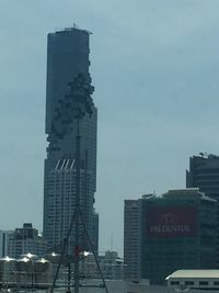 Low angle view of modern buildings against sky