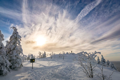 Scenic view of snow covered mountain against sky