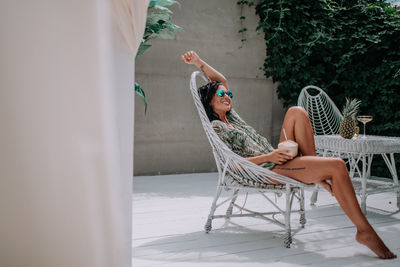 Woman sitting on chair