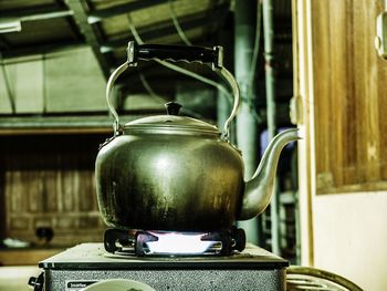 Close-up of teapot on stove