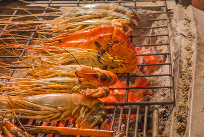 Close-up of orange on barbecue