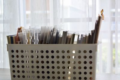 Close-up of glass bottles on table