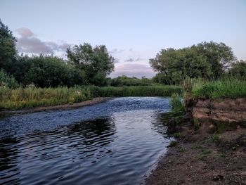 Scenic view of river against sky