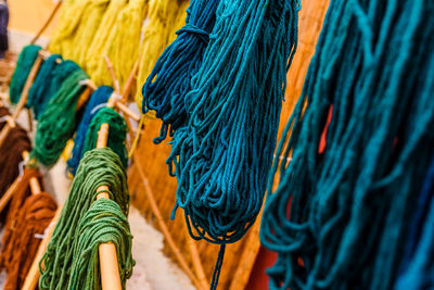 Close-up of thread hanging outdoors