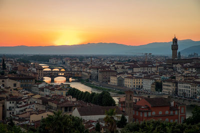 Panoramic view of the city at sunset, view from piazzale michelangelo to river arno, arnolfo tower.