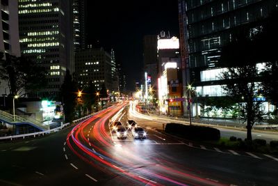 Traffic on city street at night