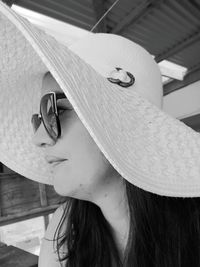 Close-up of woman wearing hat