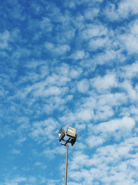 Low angle view of street light against sky