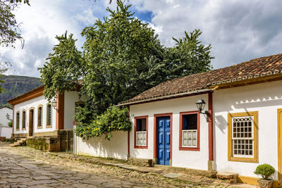 Old colorful colonial houses on a cobbled street in the historic city of tiradentes in minas gerais