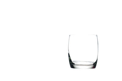 Close-up of wine glass against white background