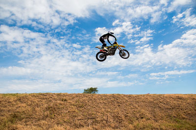 Rider jumping with motocross