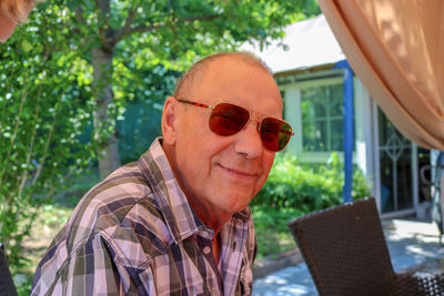 Portrait of man wearing hat outdoors