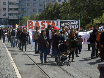 Group of people on street in city