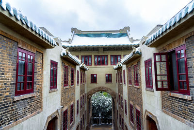 Low angle view of old building against sky