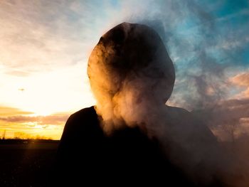 Portrait of silhouette woman against sky during sunset