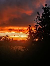 Scenic view of dramatic sky during sunset