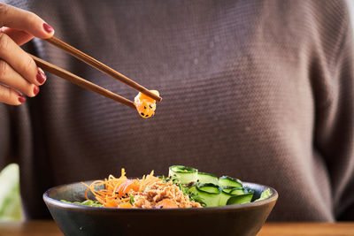 Close-up of person holding food