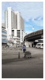 Cars on road in city