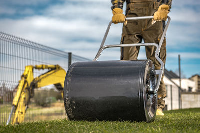 Rear view of man working in factory