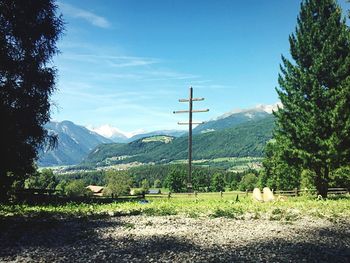 Scenic view of landscape and mountains against sky