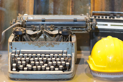 High angle view of old machine on table