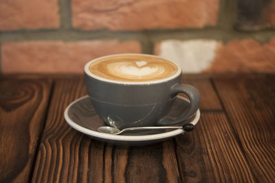 Close-up of cappuccino on table