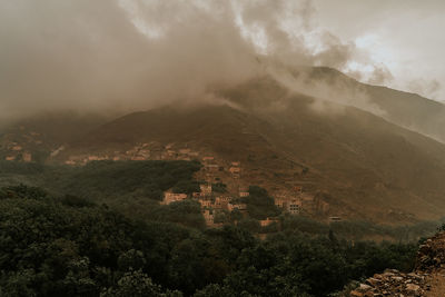 Aerial view of landscape and mountains against sky