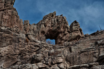 Low angle view of rock formations