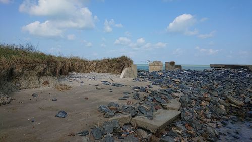 Scenic view of beach against sky