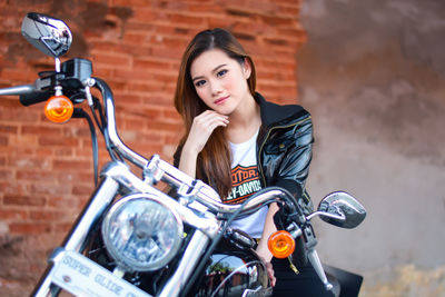 Young woman riding bicycle