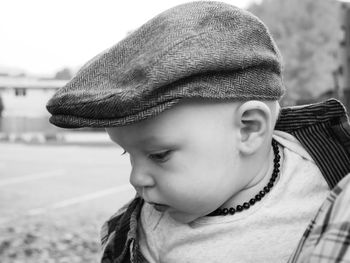 Close-up of boy wearing flat cap