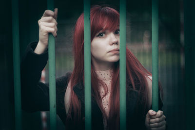 Close-up of young woman standing outdoors