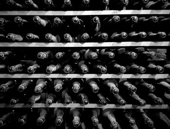 Full frame shot of bottles in shelf