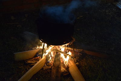 High angle view of bonfire at night