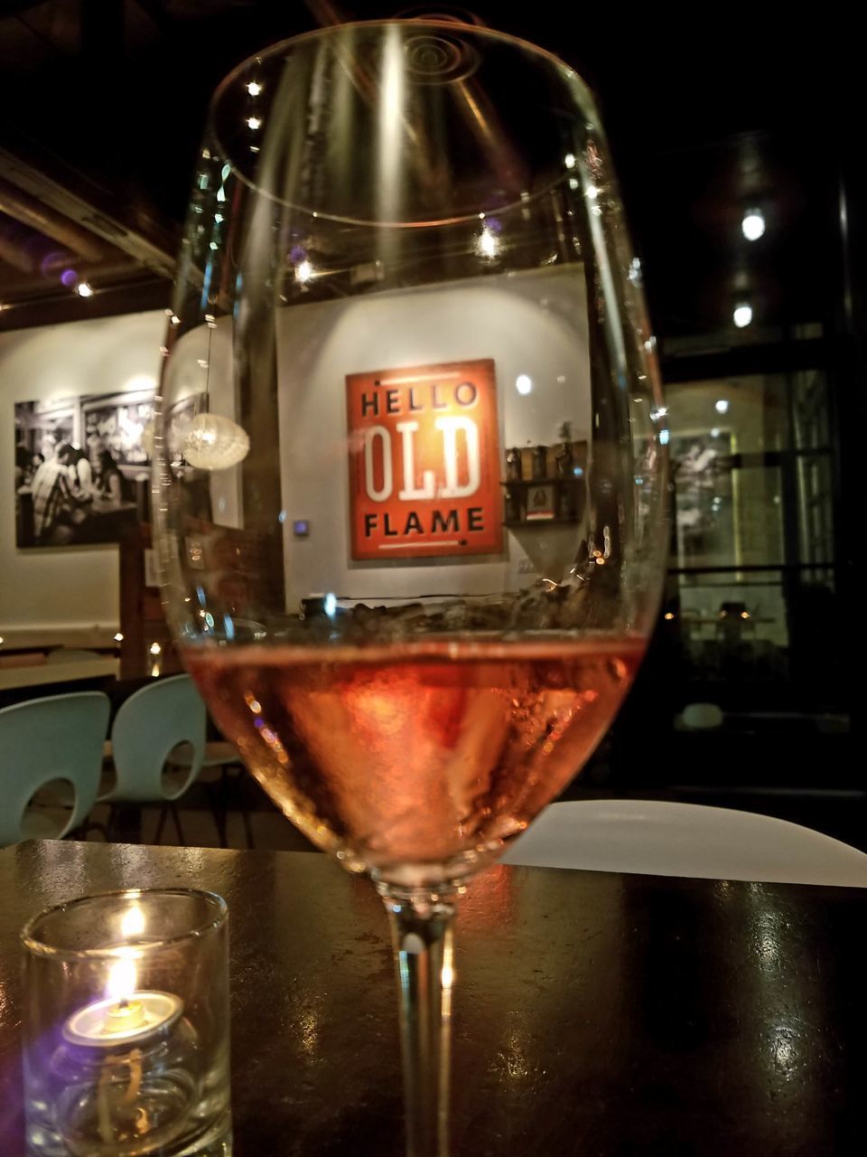 CLOSE-UP OF WINE IN ILLUMINATED GLASSES