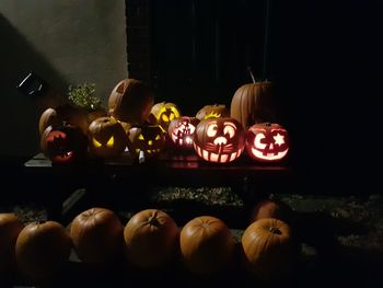 Close-up of pumpkins against black background