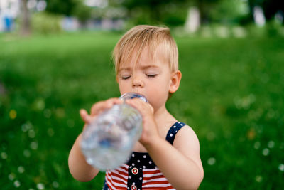 Full length of a boy holding bubbles