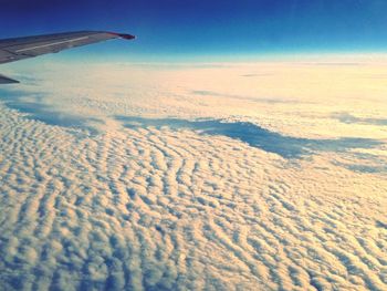 Scenic view of landscape against blue sky