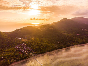 Scenic view of mountains against sky during sunset