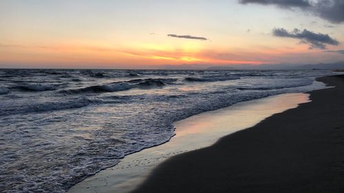 Scenic view of sea against sky during sunset
