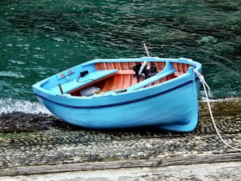 High angle view of boat moored on shore