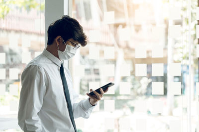 Young man using mobile phone