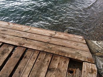 Close-up of wood against sea