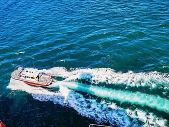 High angle view of boats sailing in sea