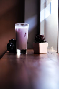 Close-up of drink on table at home