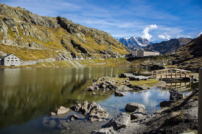 Scenic view of calm lake against mountain range