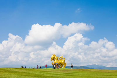 Large golden lion statue at singha park, thailand