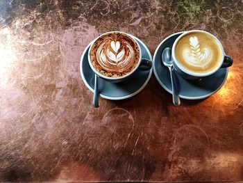 Close-up of coffee cup on table