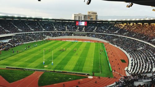 Aerial view of people in stadium